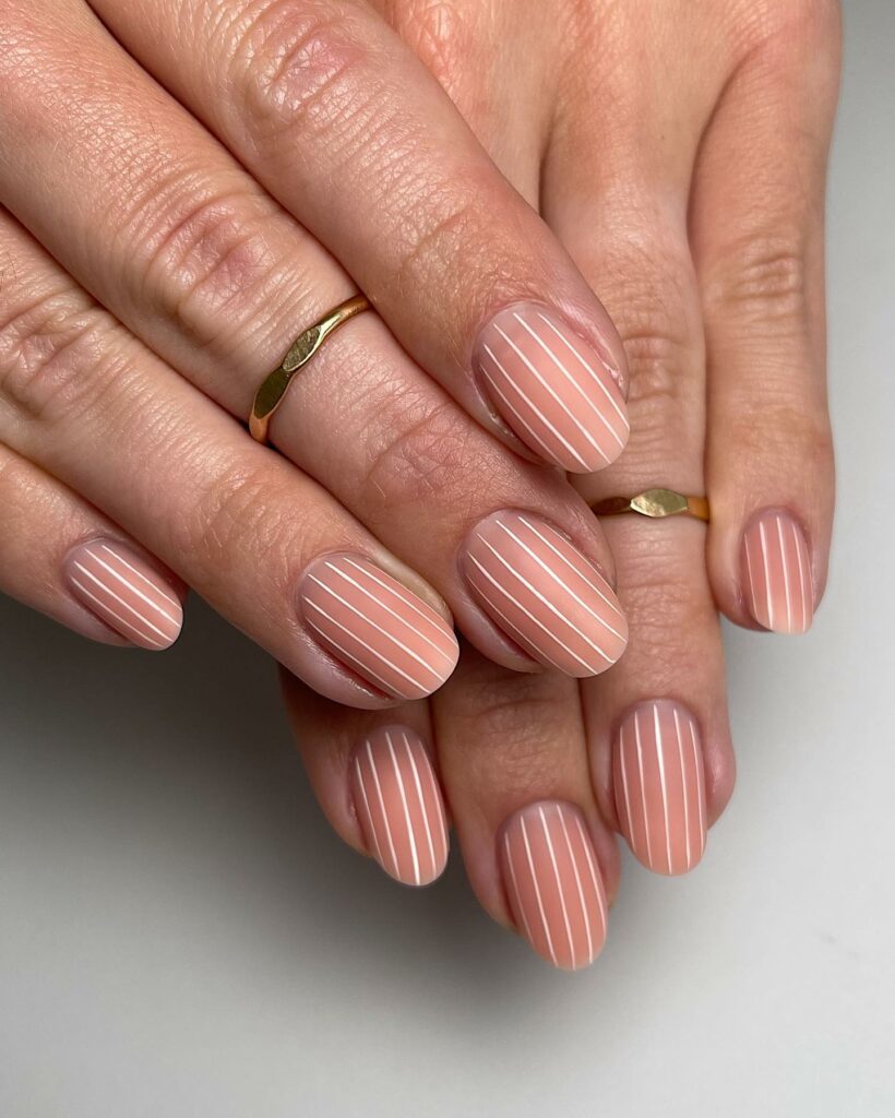 Find Your Style with 28 Beige Nail Designs of 2024 28 Peach Beige Nails With White Stripes
