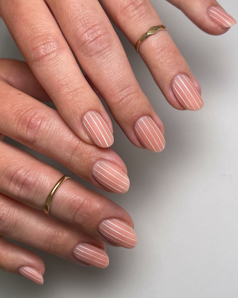 20 Latest Nude Short Nail Ideas To Try In 2024! 33 Matte Nude Short Nails With Thin White Stripes