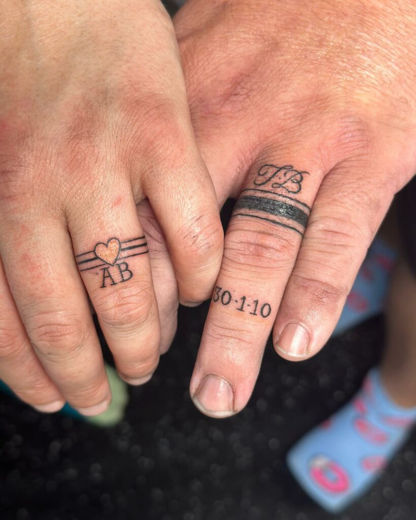 10 Best Wedding Ring Tattoo Ideas - Updated For 2024 11 Wedding Band Tattoo