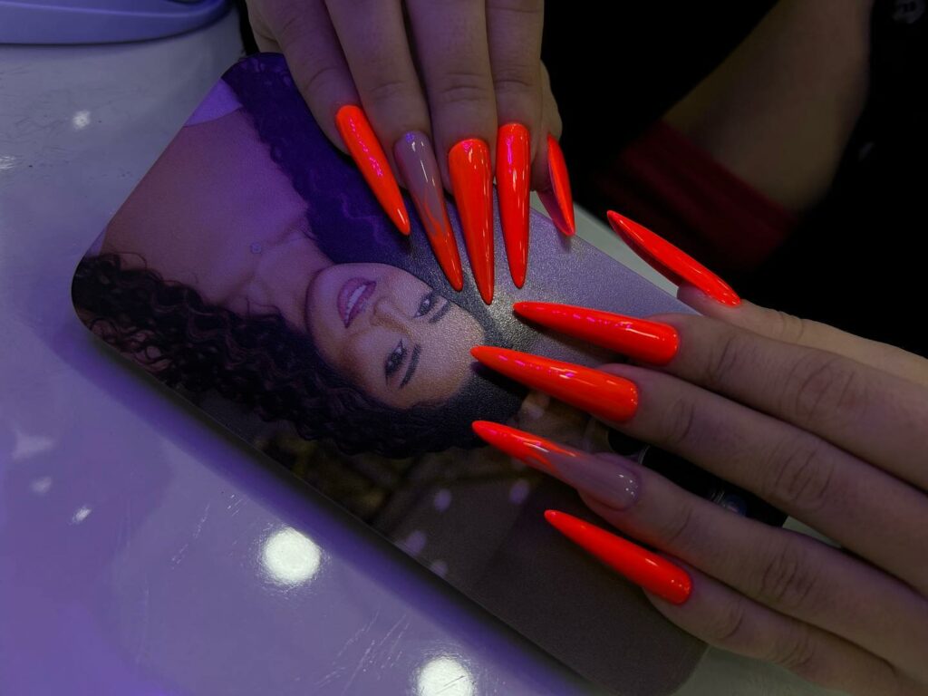 Get Inspired by 30 Neon Orange Nail Designs of 2024 41 Striking Stiletto Nails