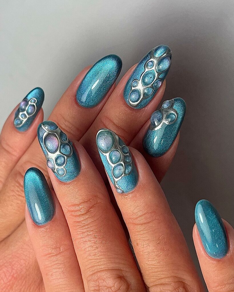 20 Latest Bubble Nail Ideas To Try In 2024! 14 Glossy Blue Nails With Bubble Design