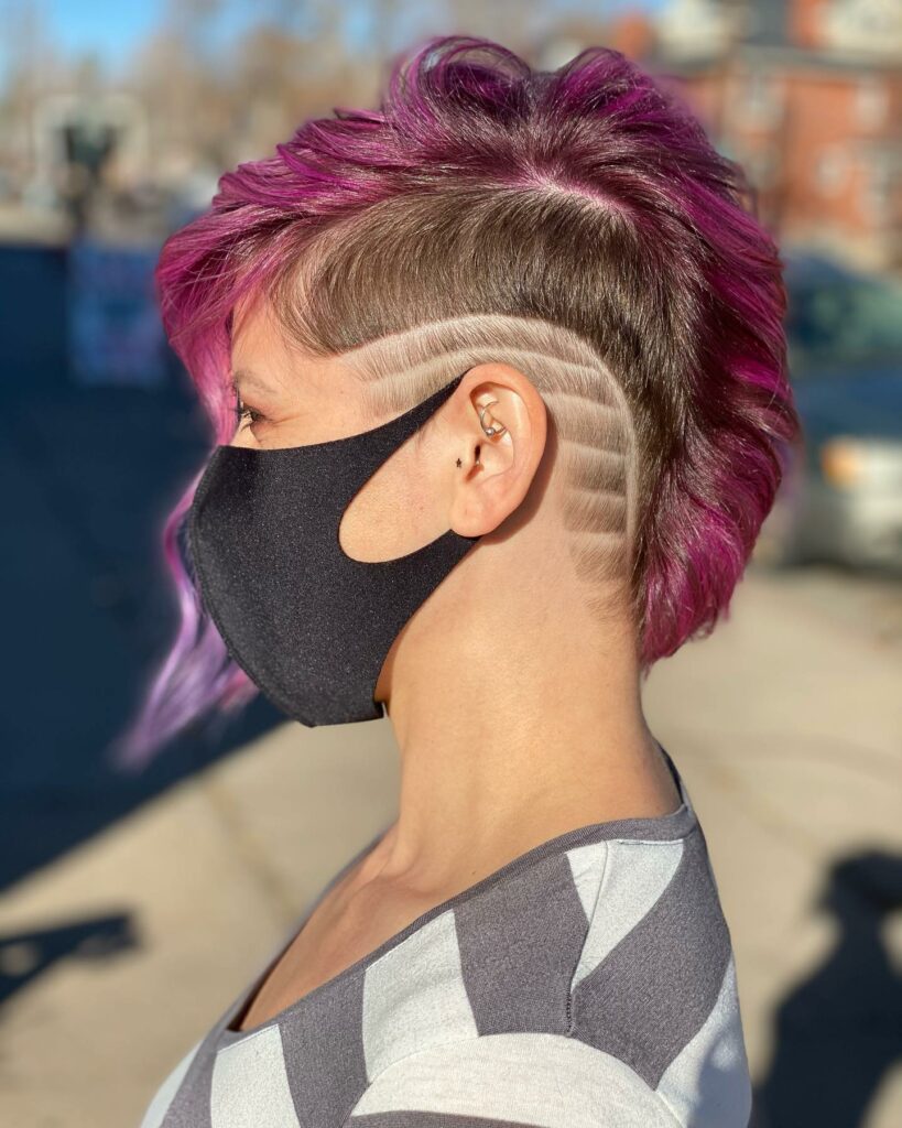35 Short-Sided Shaved Female Hairstyles to Flaunt Your Boldness in 2024 39 Mohawk with Vibrant Hues
