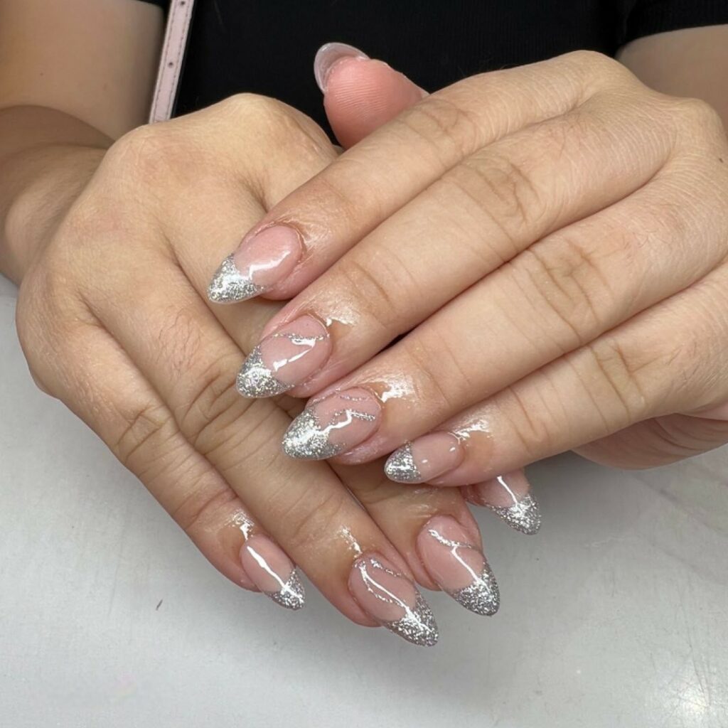 30 Latest Almond French Tip Nail Designs To Try In 2024! 37 Silver Almond Glitter Filigree Nails