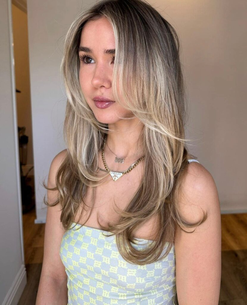 25 Butterfly Haircut Ideas to Elevate Your Style in 2024 13 Long Butterfly Cut with Face-Framing Layers