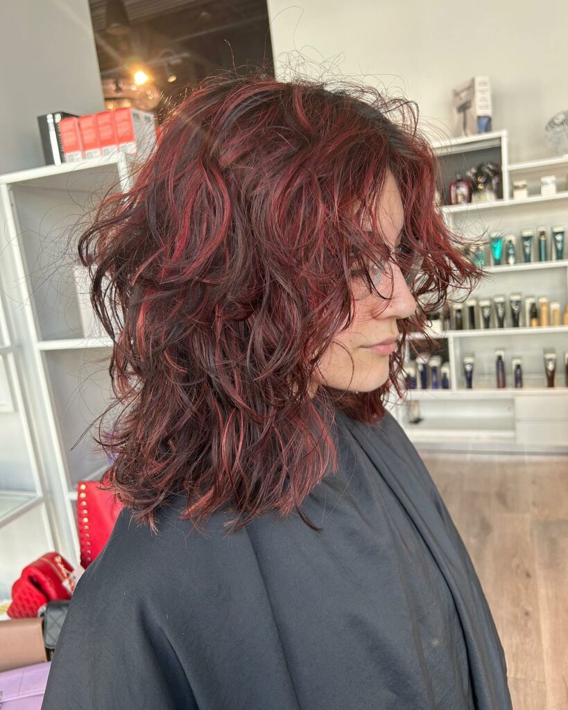 35 Dark Red Hair Ideas to Add Drama to Your Look in 2024 34 Dark Red Curly Shag