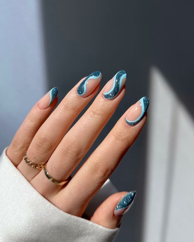 33 Latest Party Nail Ideas To Try In 2024! 22 Abstract Party Nails With Swirl And Glitter Design