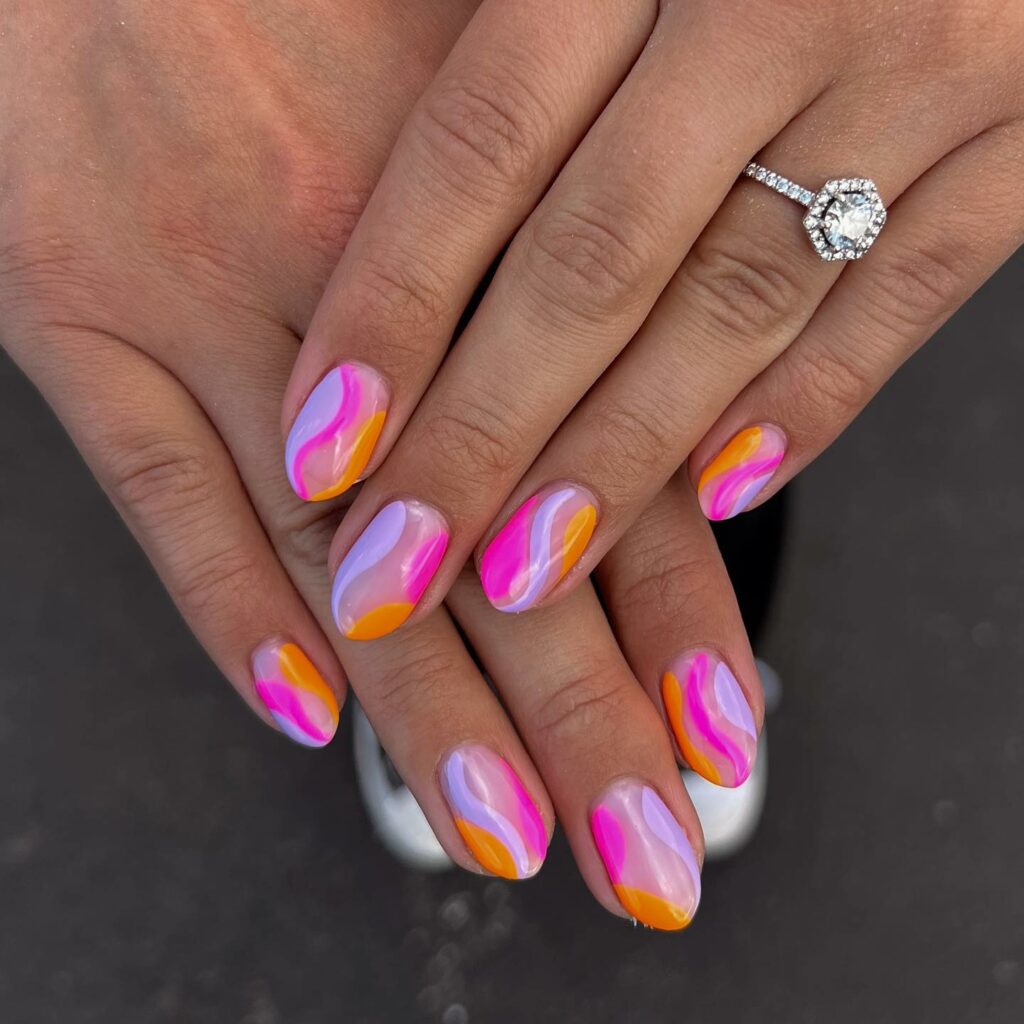 40 Latest Short Summer Nail Designs To Try In 2024! 13 Purple, Pink And Orange Abstract Short Summer Nails