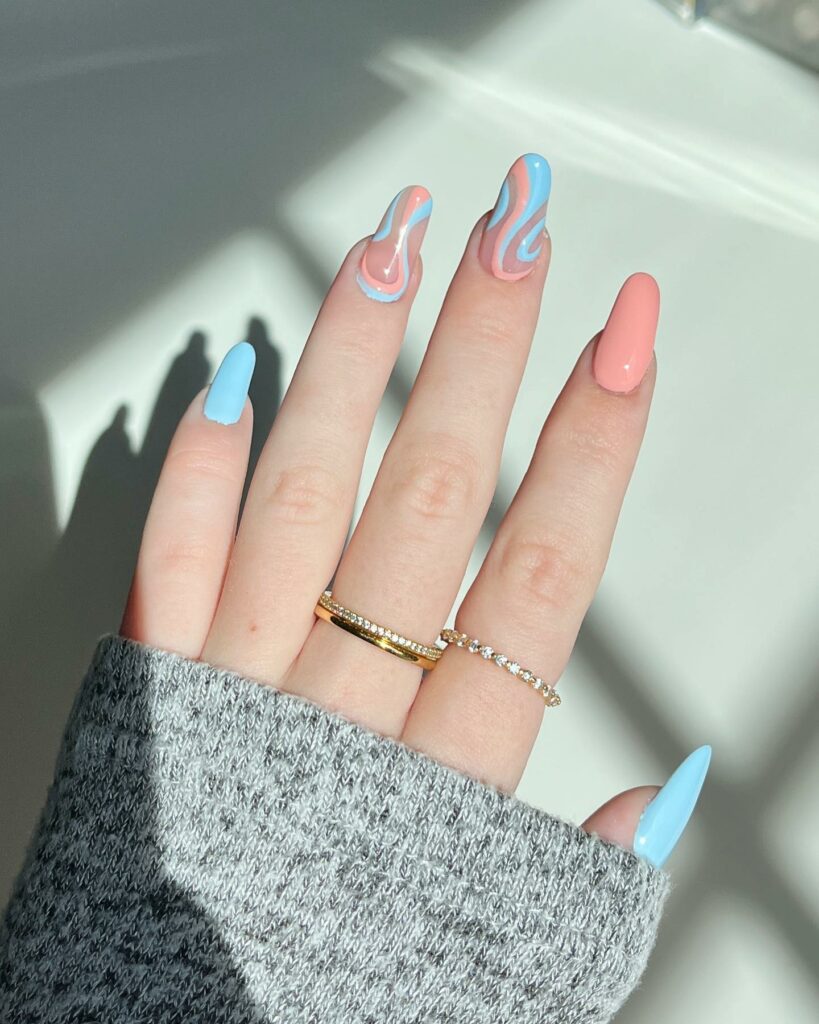 Get Swirly with 35 Swirl Nails Ideas for 2024 30 Light Blue And Peach Swirl Nail Design