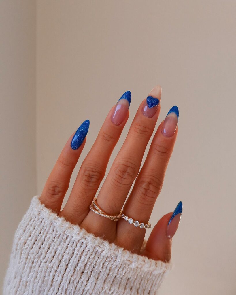 30 Latest Heart Nails Ideas To Try In 2024! 16 Heart Design On Blue French Nails With Glitter