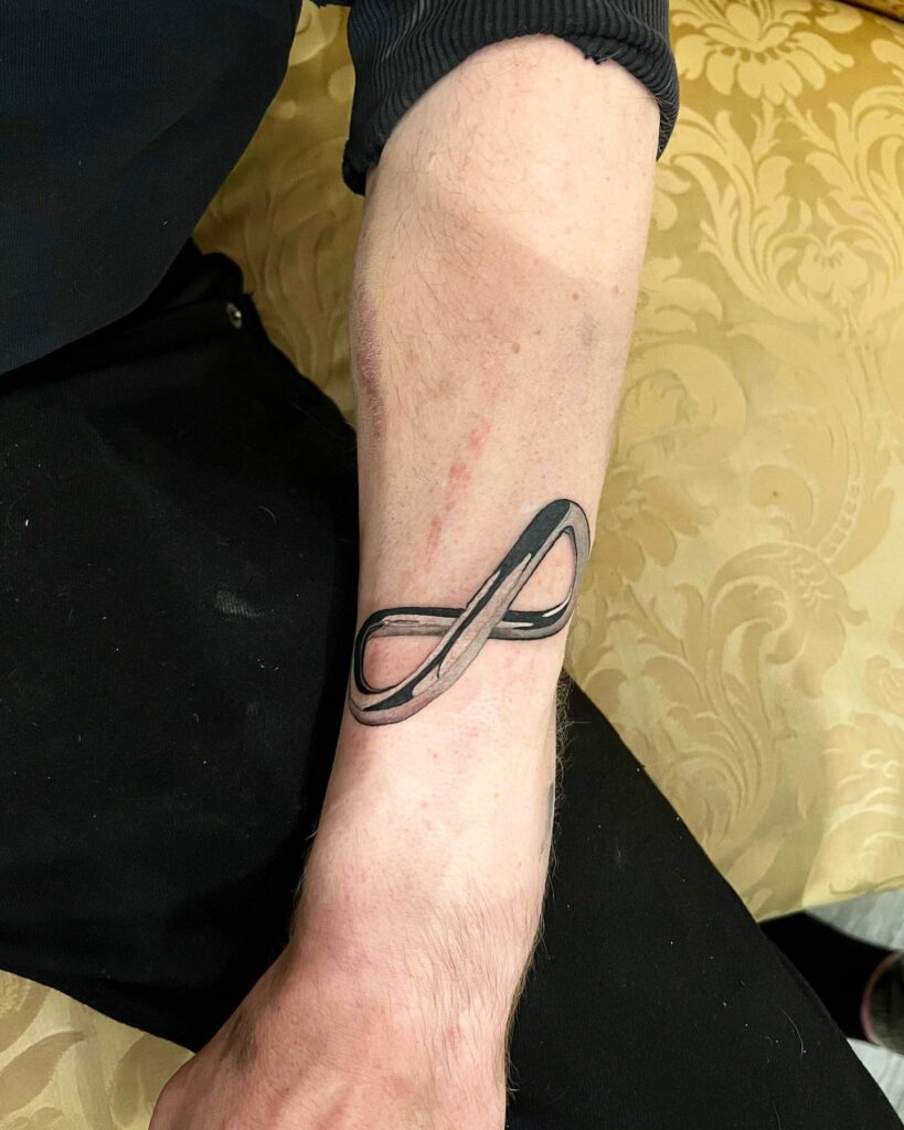 MATH AND GRAMMAR TATTOO DESIGNS & MEANINGS TO INSPIRE IN 2024 14 Infinity Symbol Tattoo
