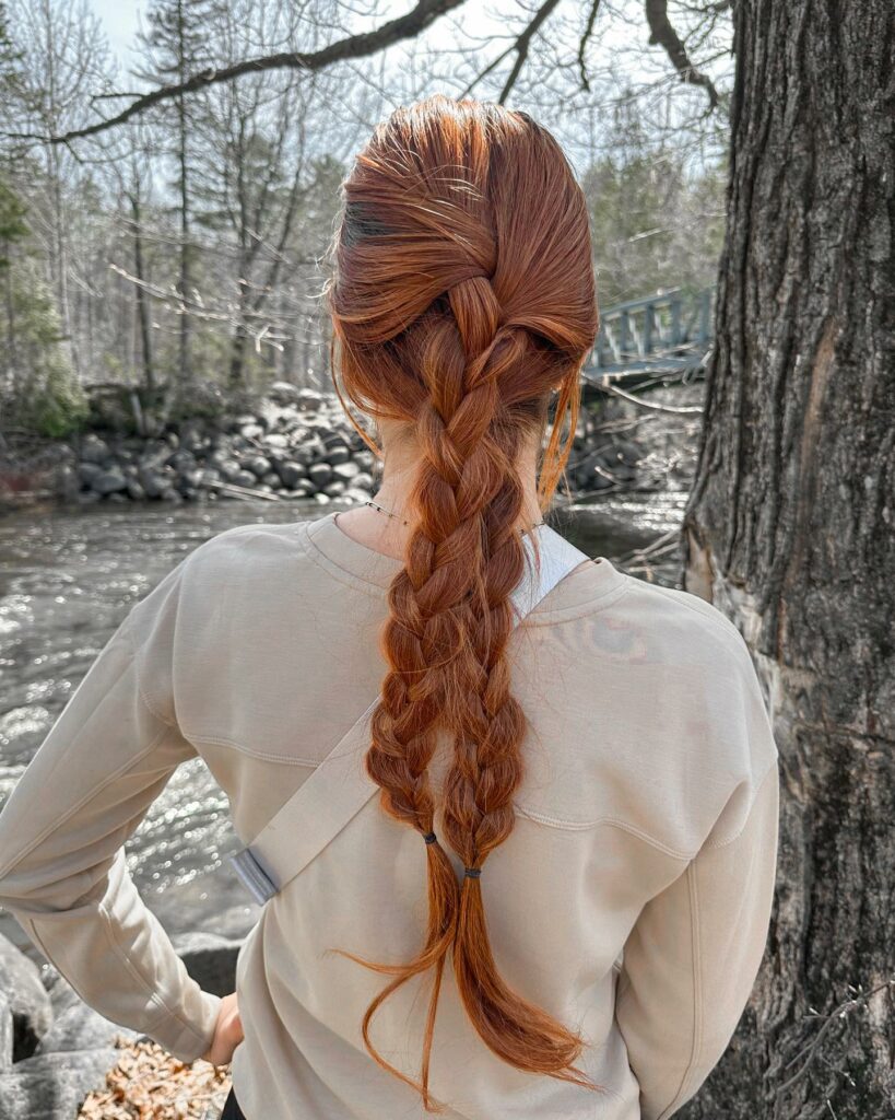 35 Strawberry Blonde Hair Ideas to Try in 2024 18 Long Strawberry Blonde with a Braid