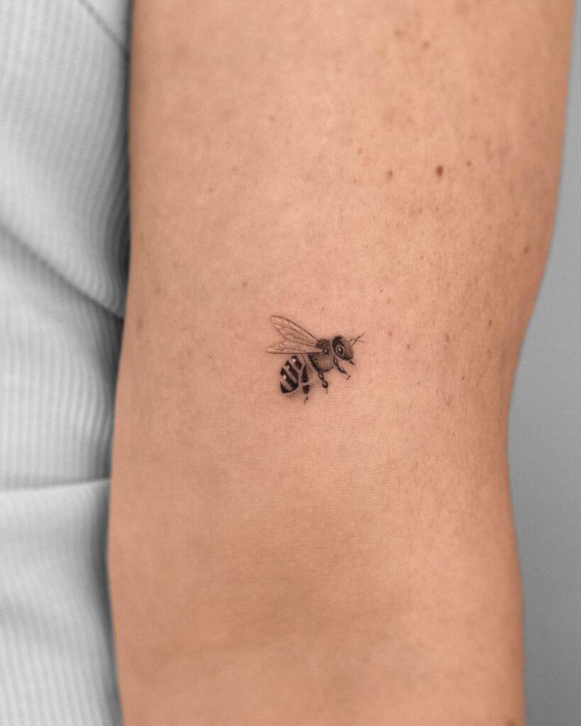 10 AMAZING BEE TATTOO IDEAS + MEANINGS - NEW FOR 2024 18 Minimalistic Bee Tattoo
