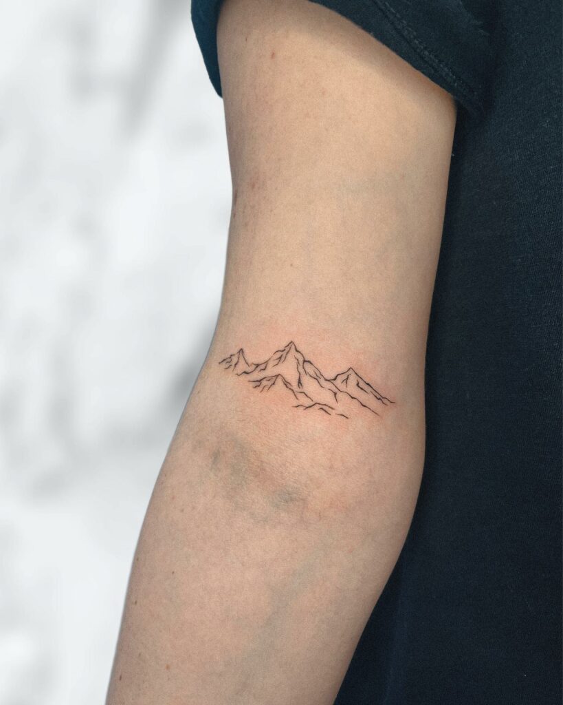 12+ Inspiring STICK-AND-POKE TATTOO IDEAS FOR 2024 15 Mountain Range Hand-Poked Tattoo Ideas