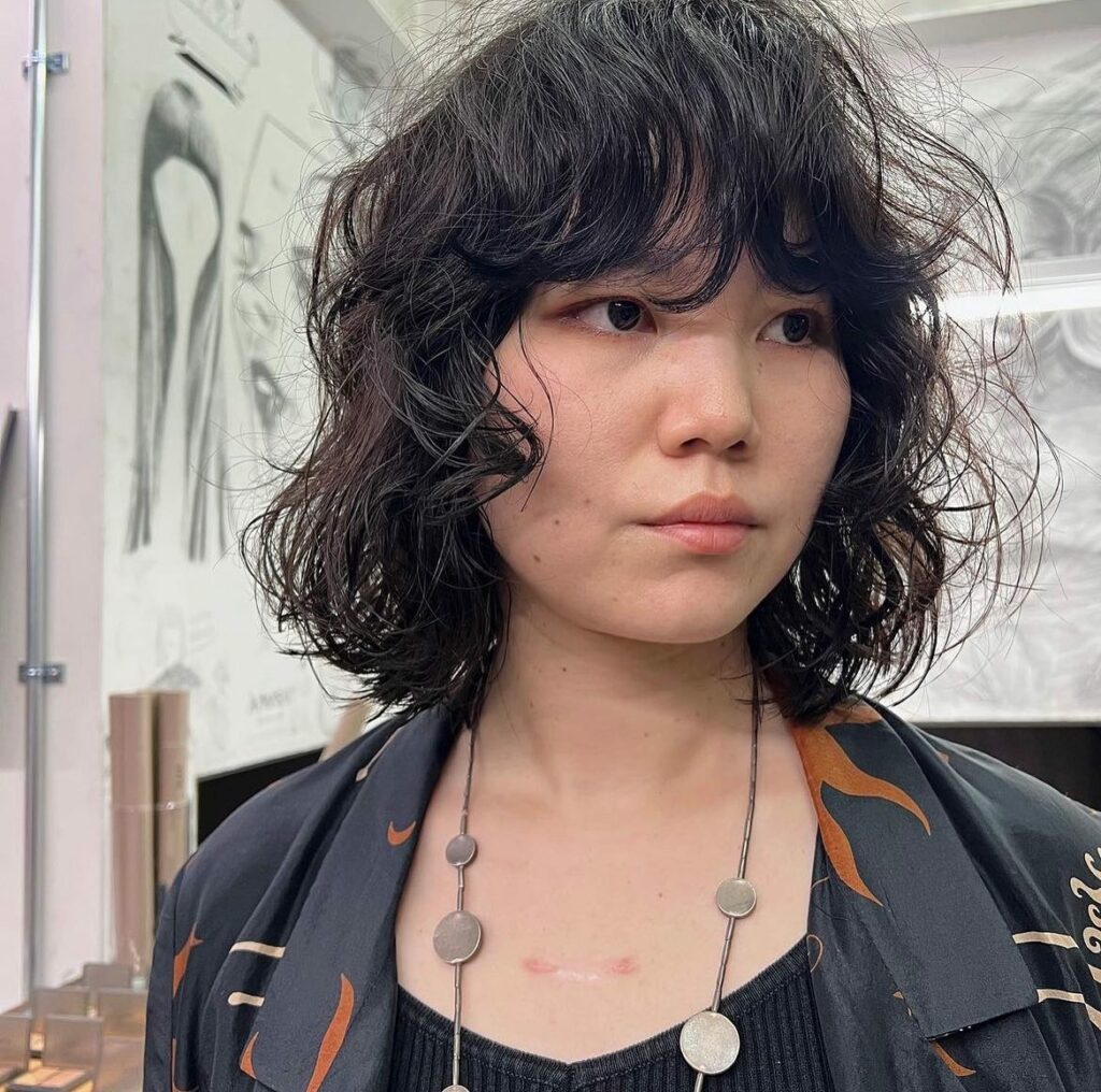 25 Curly Hair Perm Ideas to Transform Your Look in 2024 26 The Effortlessly Chic Messy Bob