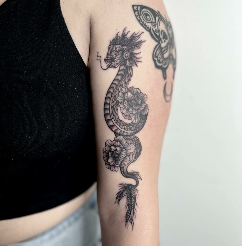 AMAZING MARIGOLD TATTOO DESIGNS & MEANINGS TO INSPIRE YOU IN 2024 17 Snake and Marigold Tattoo