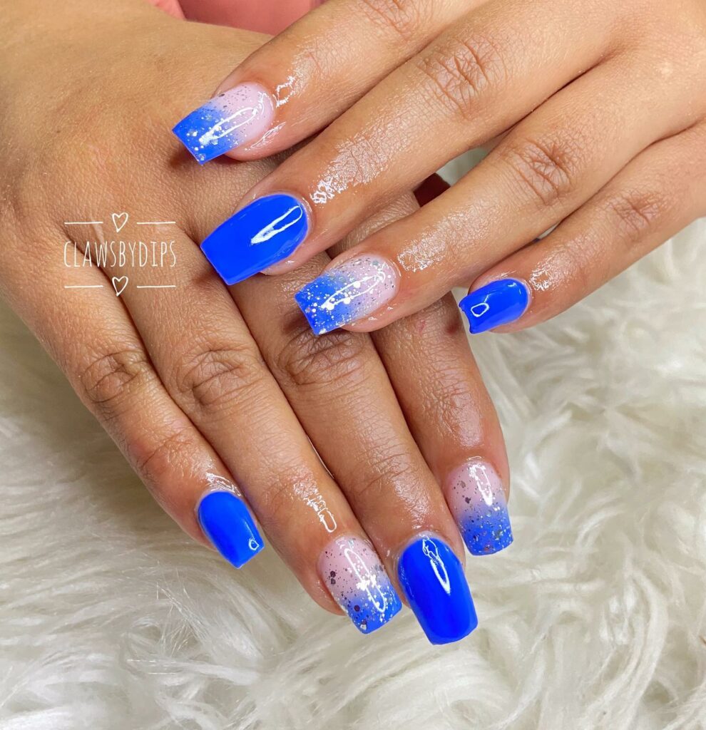 20 Latest Royal Blue Ombre Nail Designs To Try In 2024! 27 Royal Blue Ombre Nails with Silver Glitters