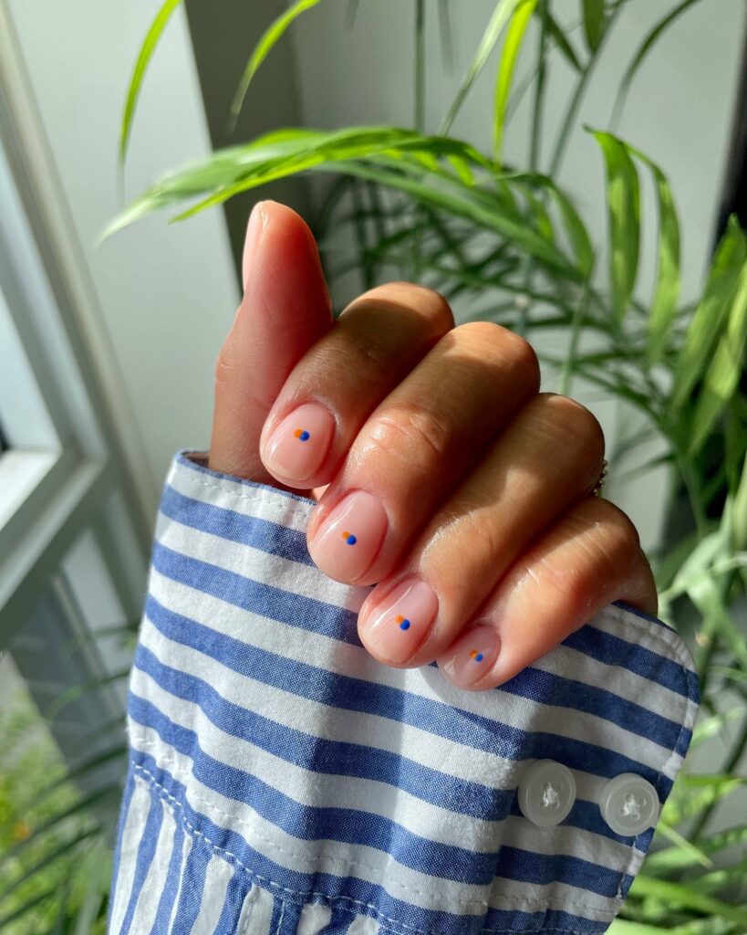 20 Latest Minimalist Nail Ideas To Try In 2024! 15 Minimalist Nails With Tiny Blue And Orange Dot