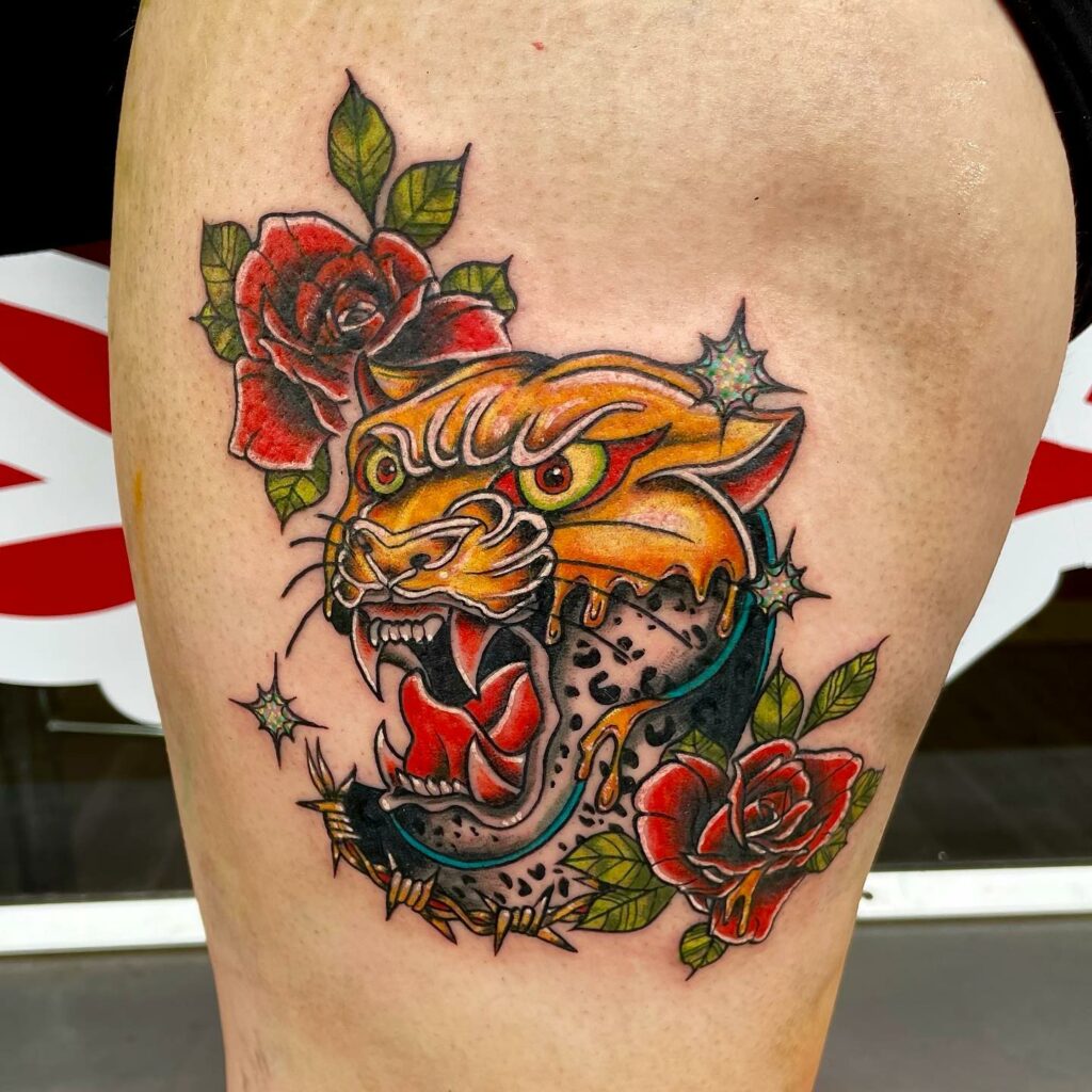 12 Amazing Barbed Wire Tattoos & Their Meanings 17 Barbed wire rose tattoo