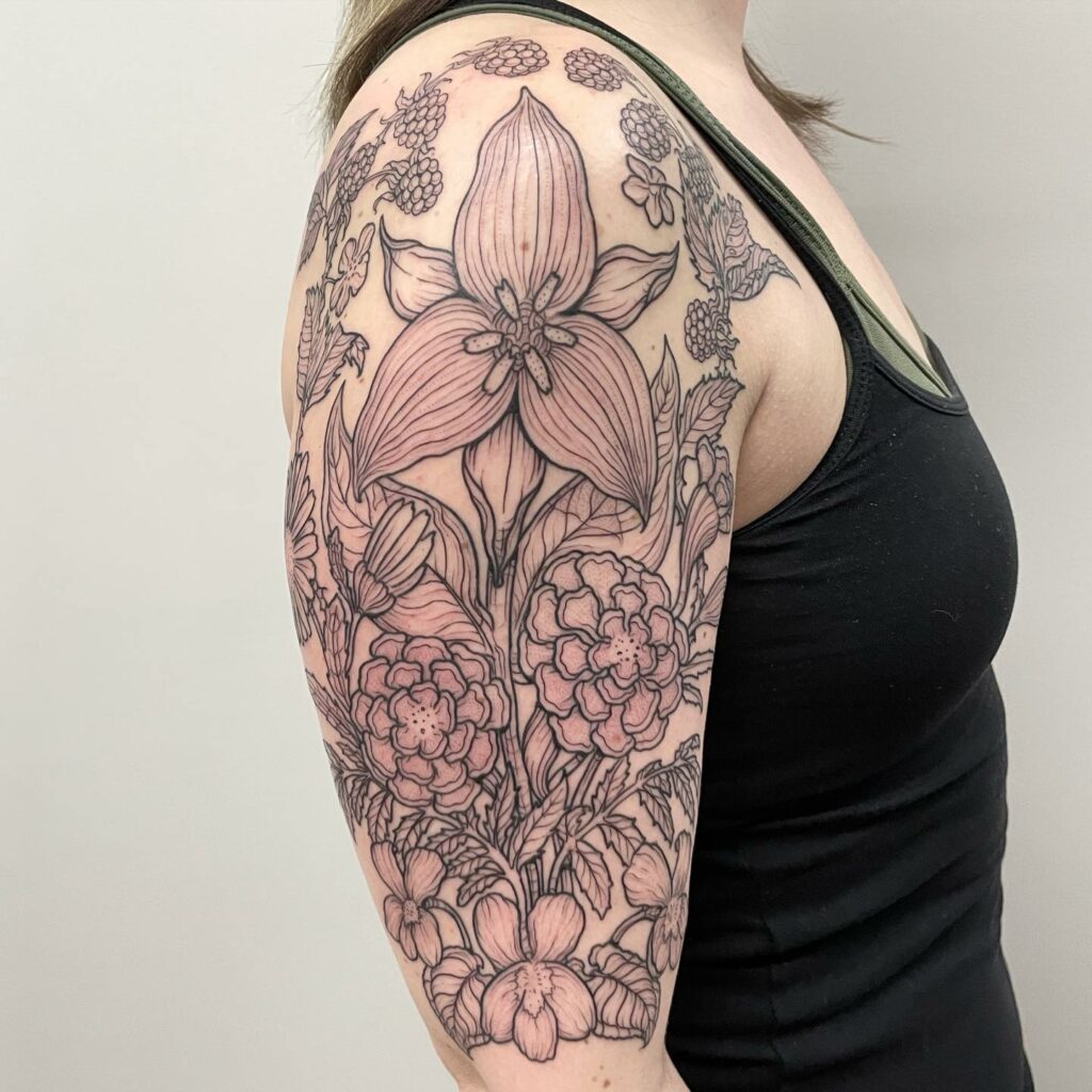 AMAZING MARIGOLD TATTOO DESIGNS & MEANINGS TO INSPIRE YOU IN 2024 22 Lily and Marigold Tattoo
