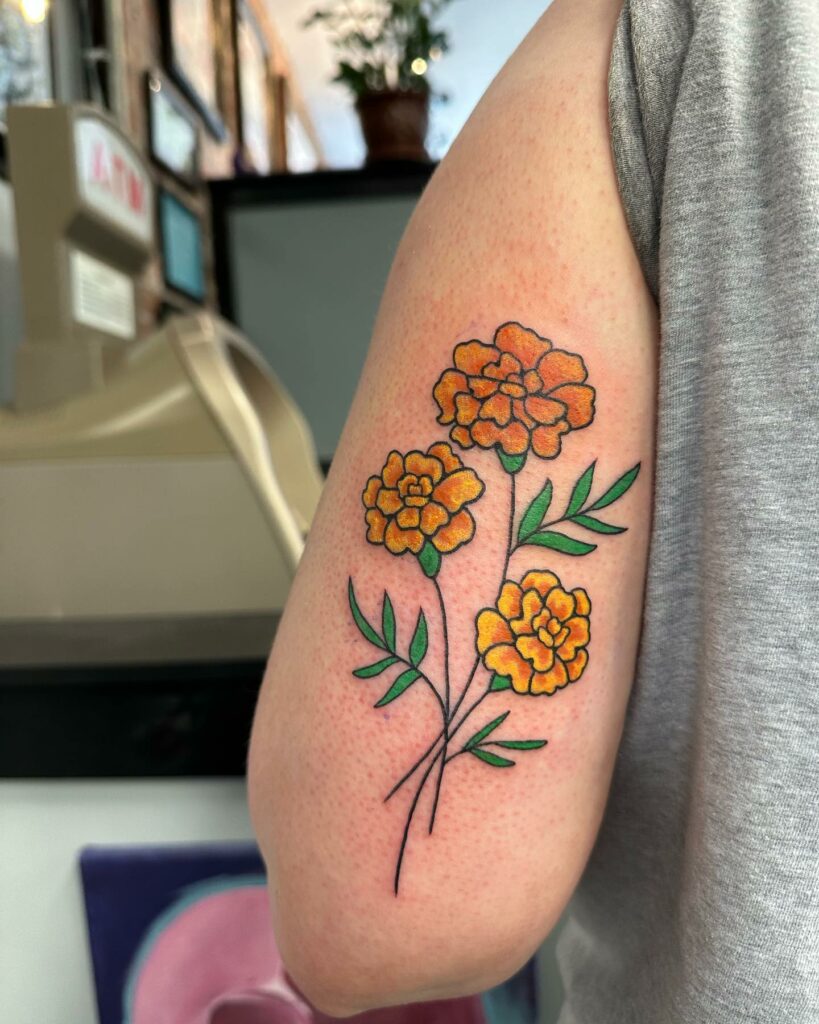 AMAZING MARIGOLD TATTOO DESIGNS & MEANINGS TO INSPIRE YOU IN 2024 23 Sweet Pea and Marigold Tattoo