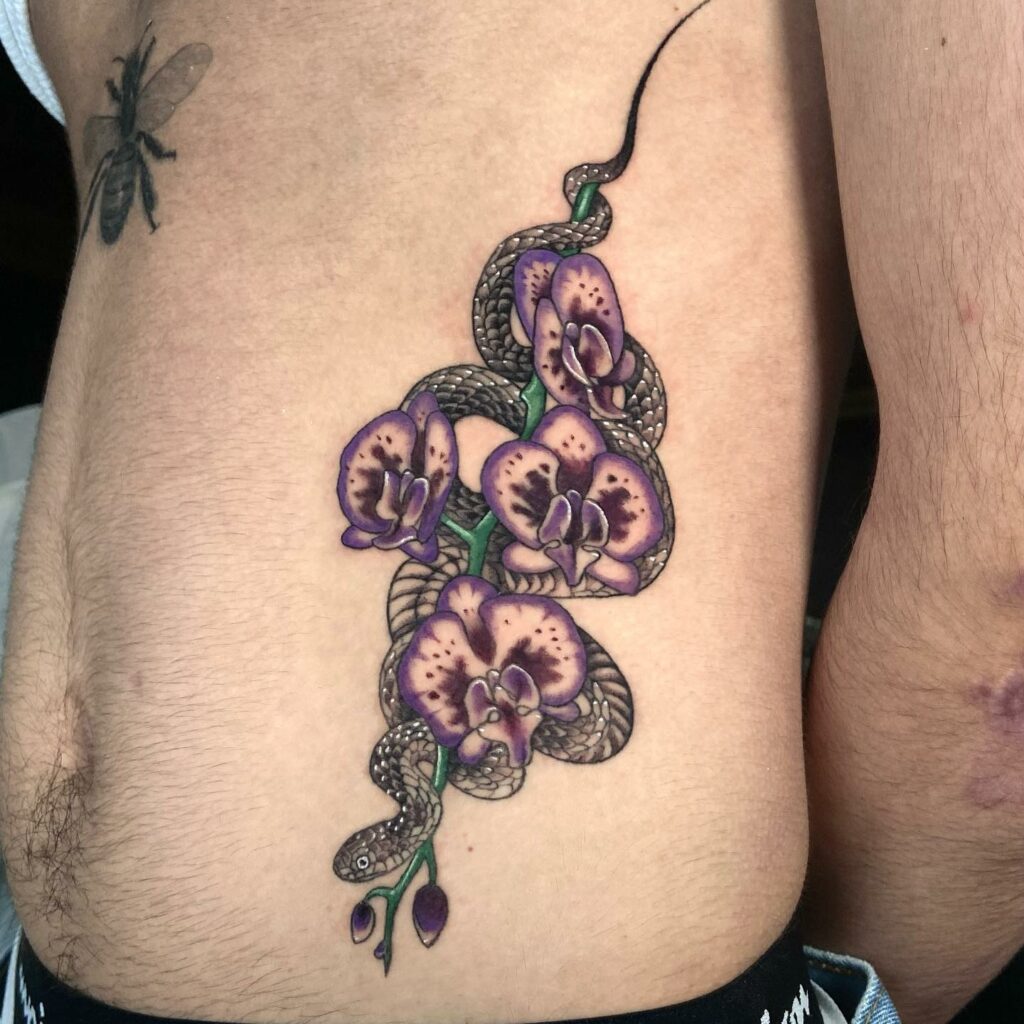 TOP 10 RIB TATTOOS DESIGNS FOR 2024 15 Snake Rib Tattoo
