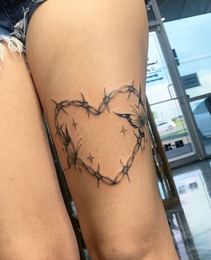 12 Amazing Barbed Wire Tattoos & Their Meanings 16 Barbed wire butterfly tattoo