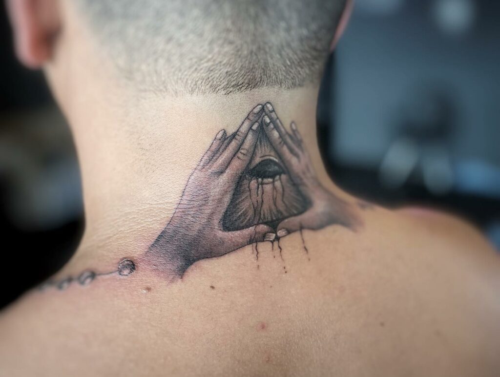 The Triangle Eye Tattoo Meaning & 10 Amazing Designs To Inspire You! 15 Triangle Eye Tattoo