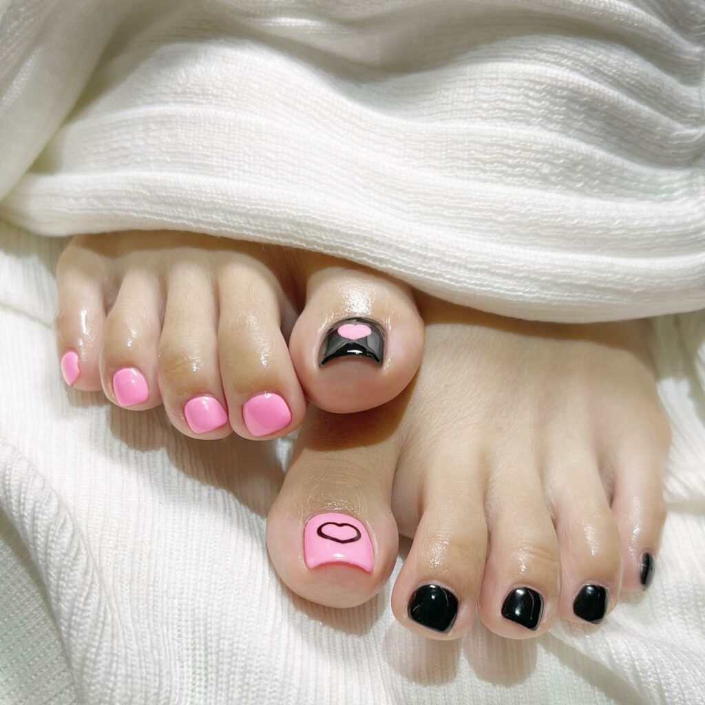 Get Playful with 30 Heart Toenail Pedicure Ideas for 2024 33 Black And Pink Heart Nail Art