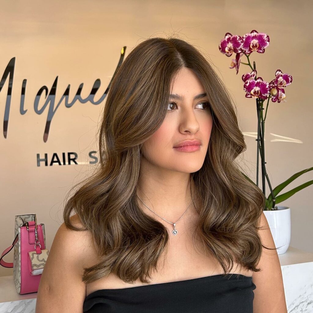 25 Long Layers With Curtain Bangs Hair Ideas to Try in 2024 13 Center-Parted Long Hair with Curtain Bangs