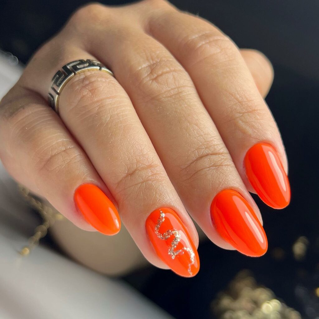 Get Inspired by 30 Neon Orange Nail Designs of 2024 31 Glam Orange Nails With Gold Foil