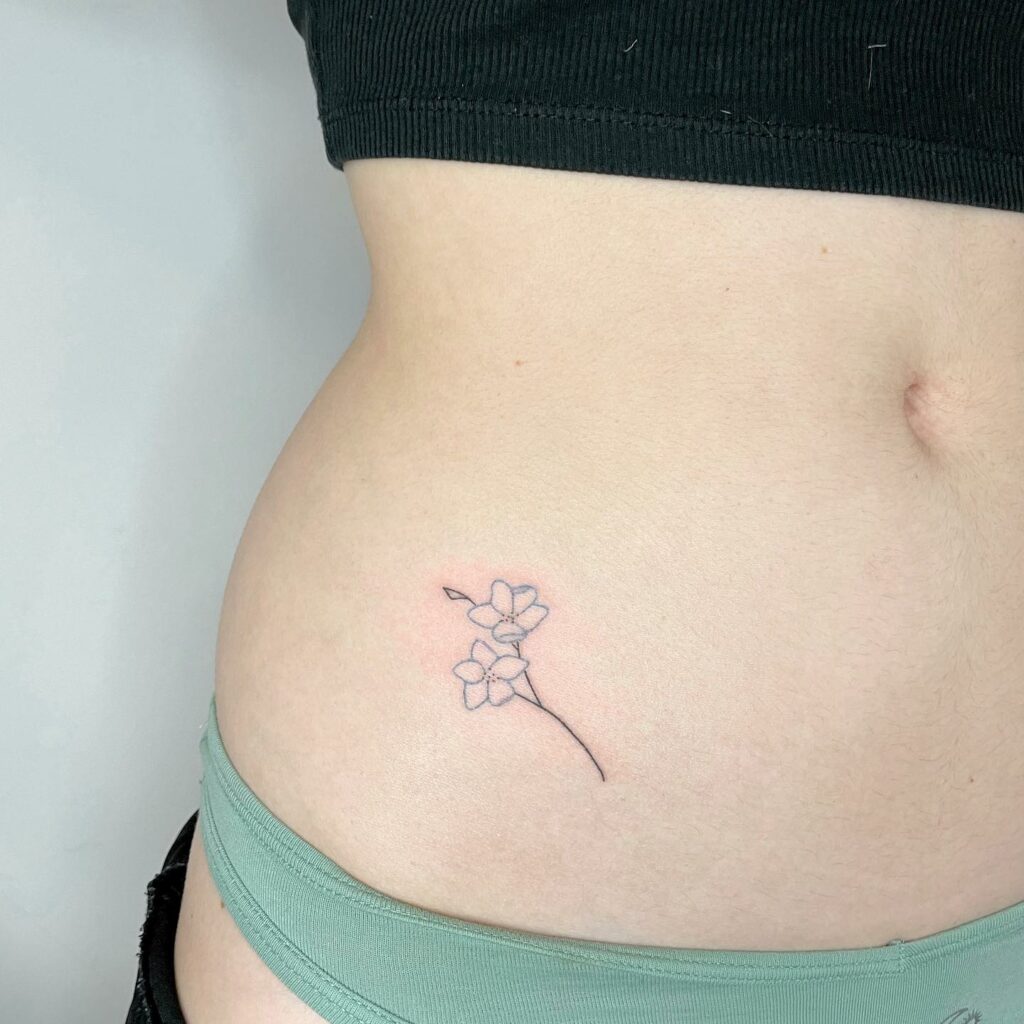 12+ Inspiring STICK-AND-POKE TATTOO IDEAS FOR 2024 12 Floral Hand-Poked Tattoo Ideas