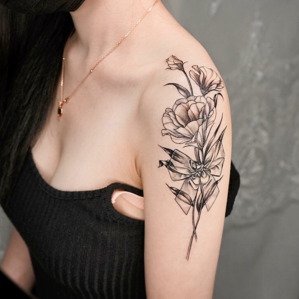 BEAUTIFUL SHOULDER TATTOO IDEAS FOR WOMEN IN 2024 12 Smile Print Shoulder Tattoos For Women