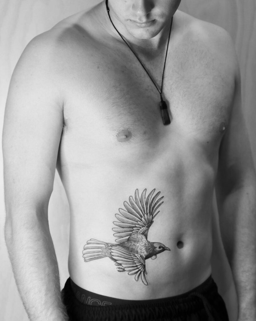 TOP 10 RIB TATTOOS DESIGNS FOR 2024 21 Bird Rib Tattoo