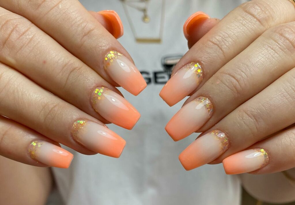 30 Latest Orange Ombre Nail Designs To Try In 2024! 25 Pastel Orange Ombre Nails With Gold Glitter