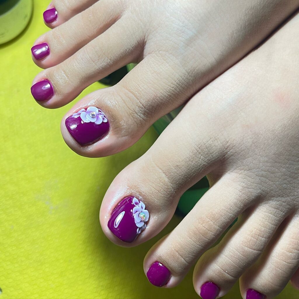 15 Latest Dark Purple Pedicure Designs To Try In 2024! 23 Dark Purple Pedicure With 3D Flower Design