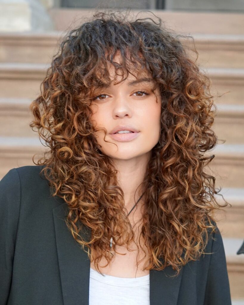35 Long Wolf Cut Hairstyle Ideas to Try in 2024 16 Long Curly Wolf Cut