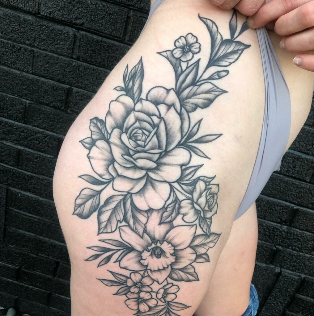 12 Amazing Thigh Tattoo Ideas - UPDATED 2024 18 Black and Gray Thigh Tattoo