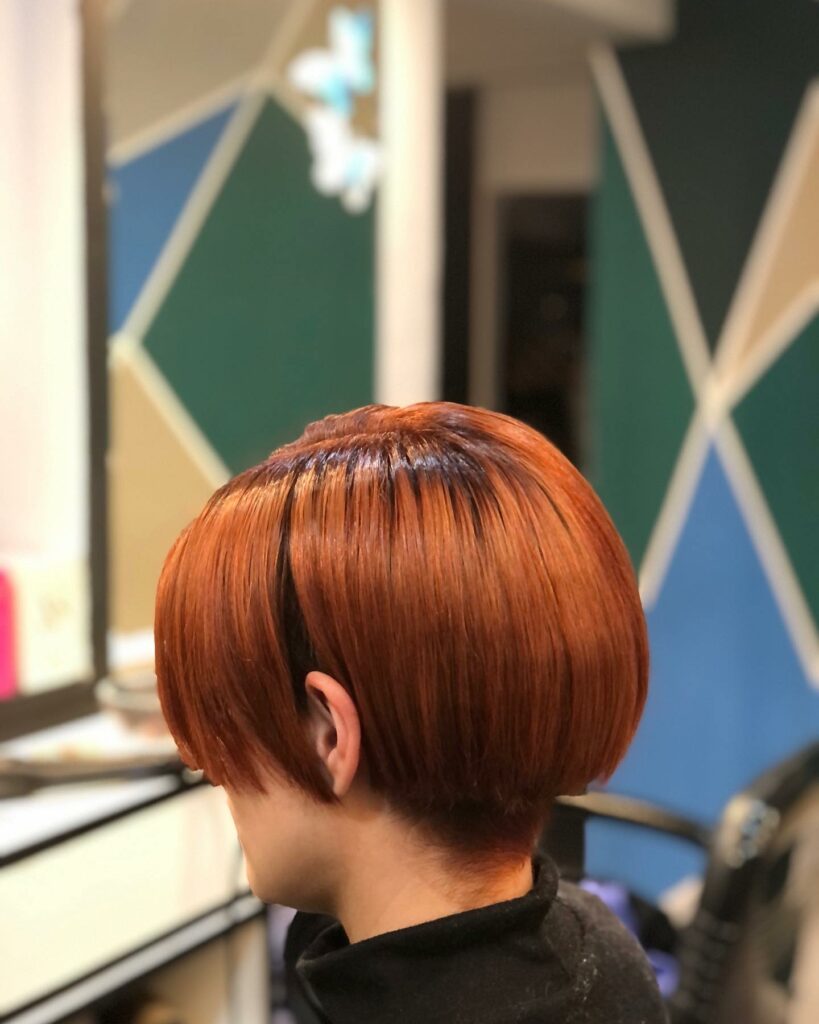 35 Short-Sided Shaved Female Hairstyles to Flaunt Your Boldness in 2024 29 Stacked Pixie With Shaved Nape
