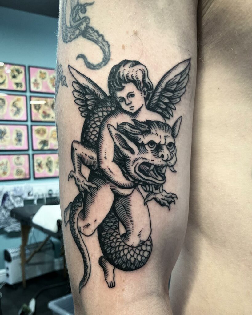 Amazing Cherub and Baby Angel Tattoo Designs and Meanings To Inspire In 2024 11 Cherub Tattoo