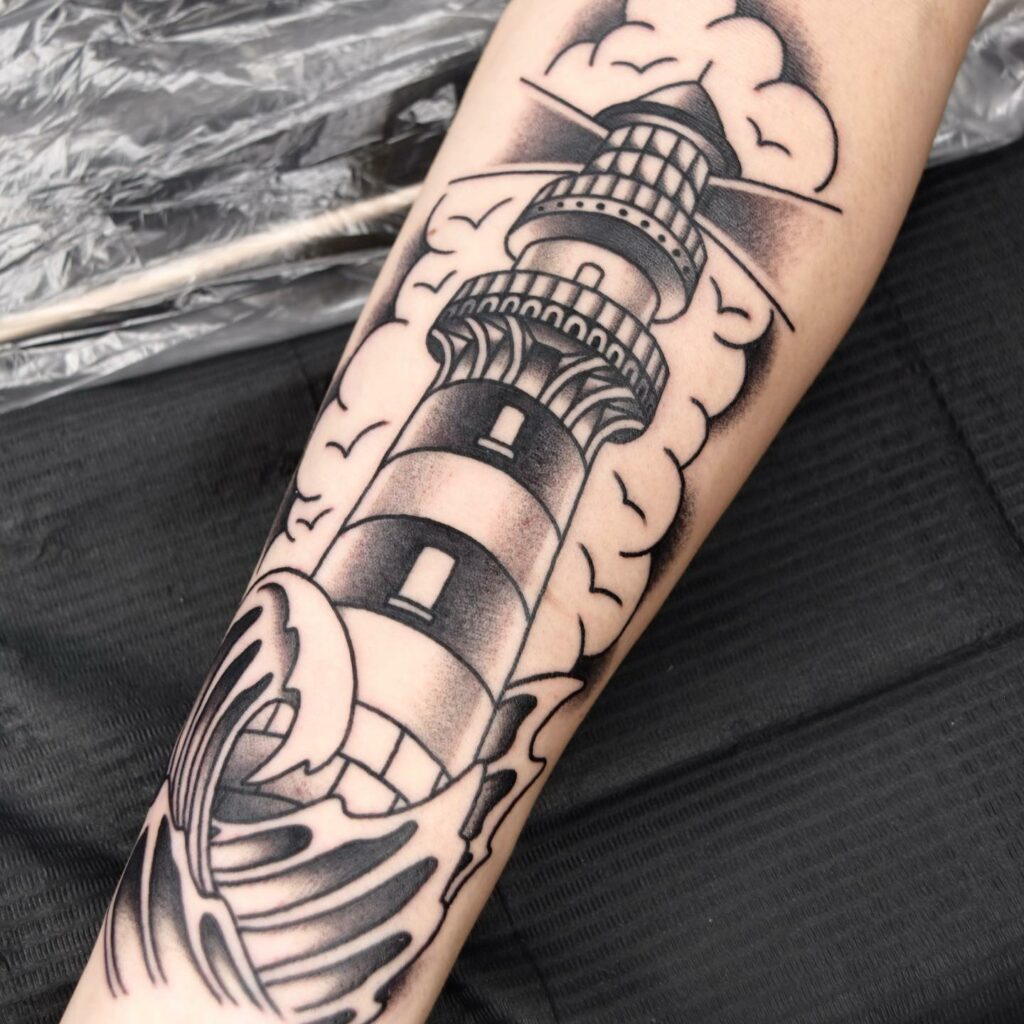 11 LIGHTHOUSE TATTOOS IDEAS + MEANINGS - UPDATED 2024 12 Nautical Star & Lighthouse Tattoos