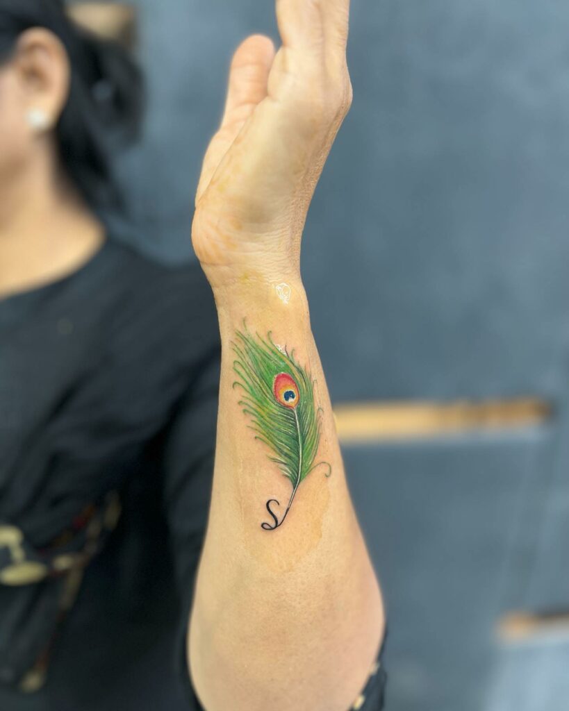 Top 10 Peacock Tattoo Designs + Meanings In 2024 12 Peacock Feather Tattoo