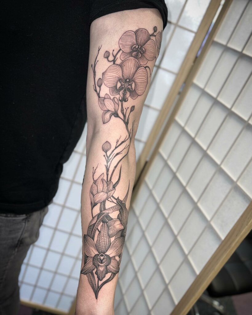AMAZING ORCHID TATTOOS + THEIR COOL MEANINGS 22 Dot-work Orchid Tattoo