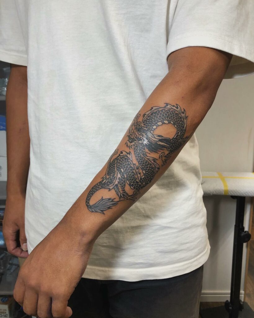 10 BEST STRENGTH TATTOOS WE'VE SEEN IN 2024! 11 Dragon Tattoo