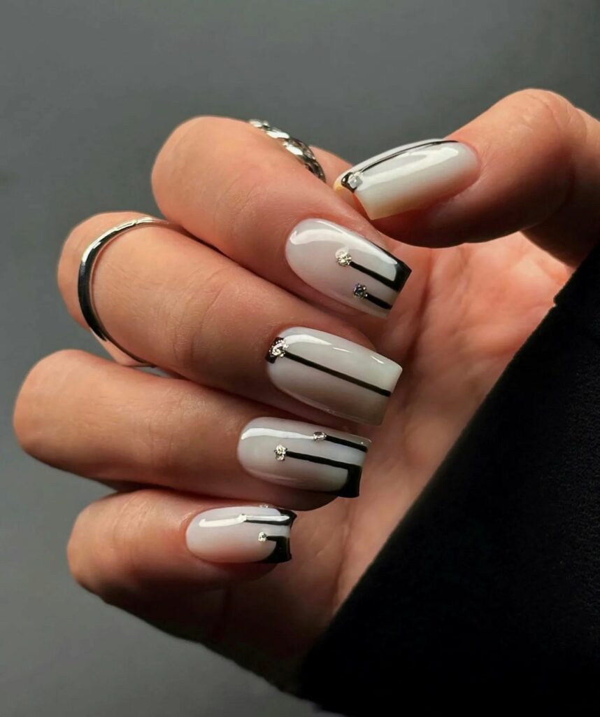 40 Latest Trendy Nail Ideas To Try In 2024! 50 White Square Trendy Nails With Black Line And Rhinestones