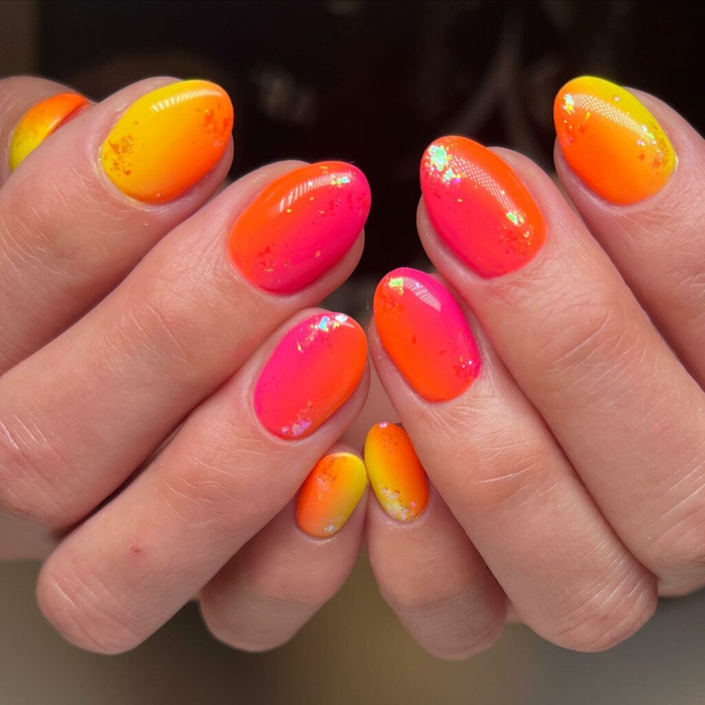 Get Inspired by 30 Neon Orange Nail Designs of 2024 44 Ombre And Glitter