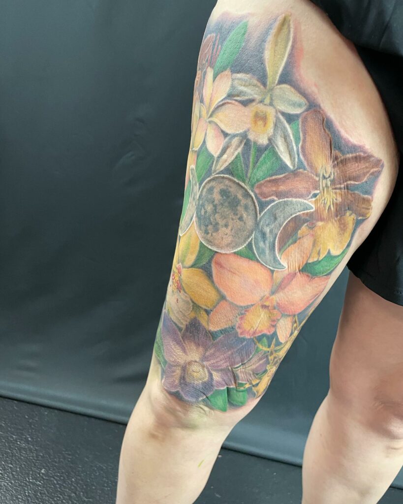 AMAZING ORCHID TATTOOS + THEIR COOL MEANINGS 13 Orange Orchid Tattoo