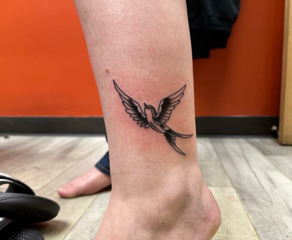 BEAUTIFUL BIRD TATTOO DESIGN YOU NEED TO SEE IN 2024 20 Swallow Tattoos