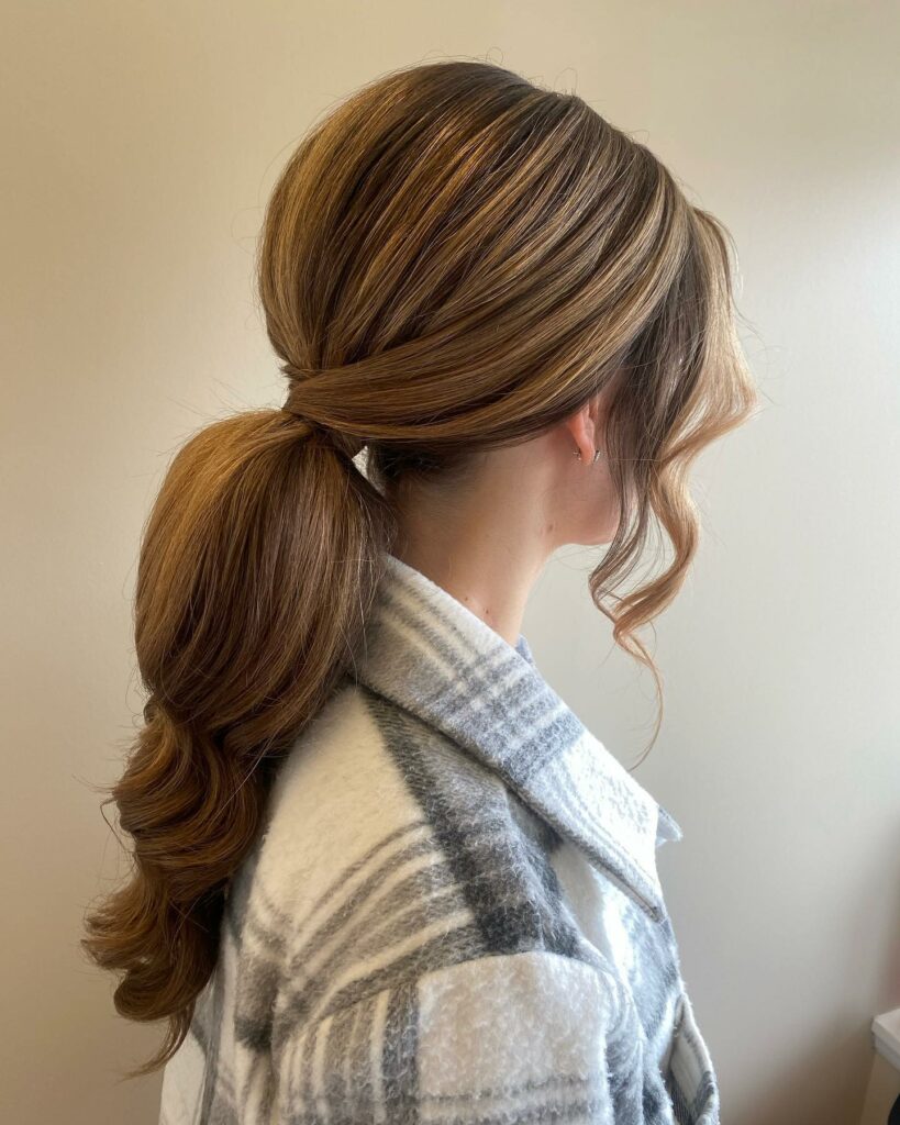 35 Ponytail Hairstyles Ideas for Effortless Elegance in 2024 29 The Ideal Low Ponytail for Layered Hair