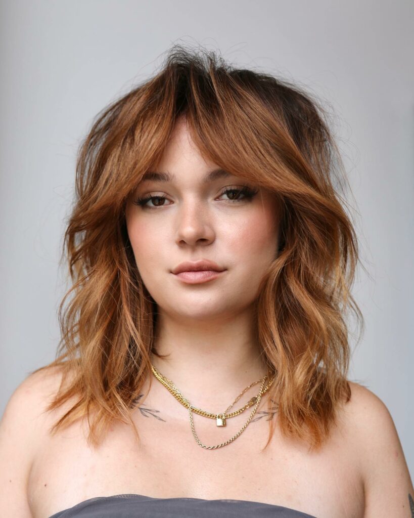 35 Reddish Brown Hair Color Ideas to Try in 2024 34 Copper Hair and Curtain Bangs