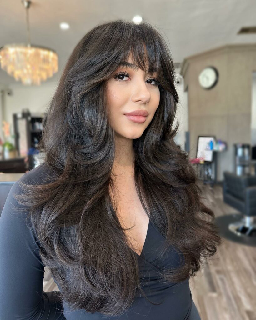25 Butterfly Haircut Ideas to Elevate Your Style in 2024 23 Shoulder-Length Cut with Voluminous Layers